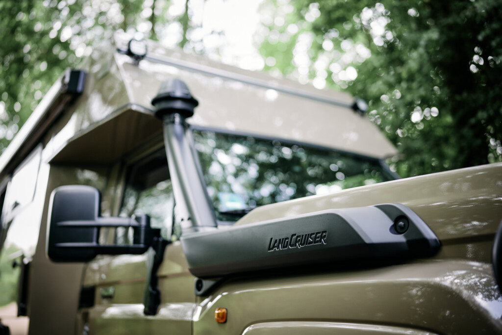 Land Cruiser lettering on the bonnet next to the snorkel and mirror